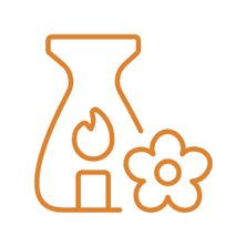Oil diffuser with flame and flower to represent essential oil recipes